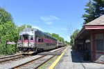 MBTA Train # 410 is seen arriving into the station heading to Boston. 
